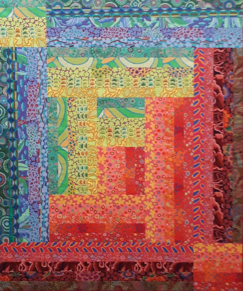 May include: A colorful quilt with a log cabin pattern. The quilt is made of various fabrics with different patterns and colors, including red, orange, yellow, green, blue, and purple.