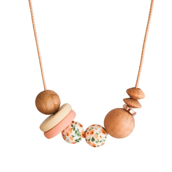 baby wearing and Breastfeeding fiddle necklace with beechwood and silicone flower detail for nursing and feeding | Fidget necklace for mum