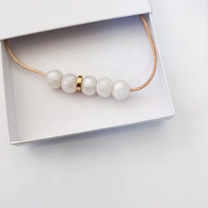 Silicone Nursing necklace for breastfeeding mum with gold and pearl effect beads. image 15