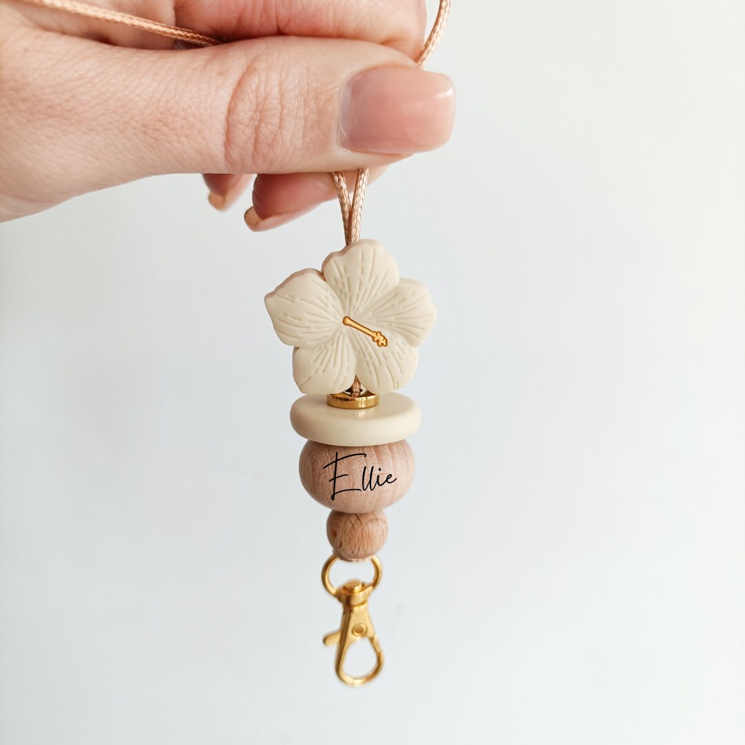 personalized beaded lanyard for badge, keys and ID holder. Floral lily flower lanyard in cream with breakaway clasp.