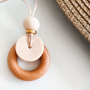 natural wooden floral cream breastfeeding and nursing necklace | organic feeding and baby wearing aid for mum