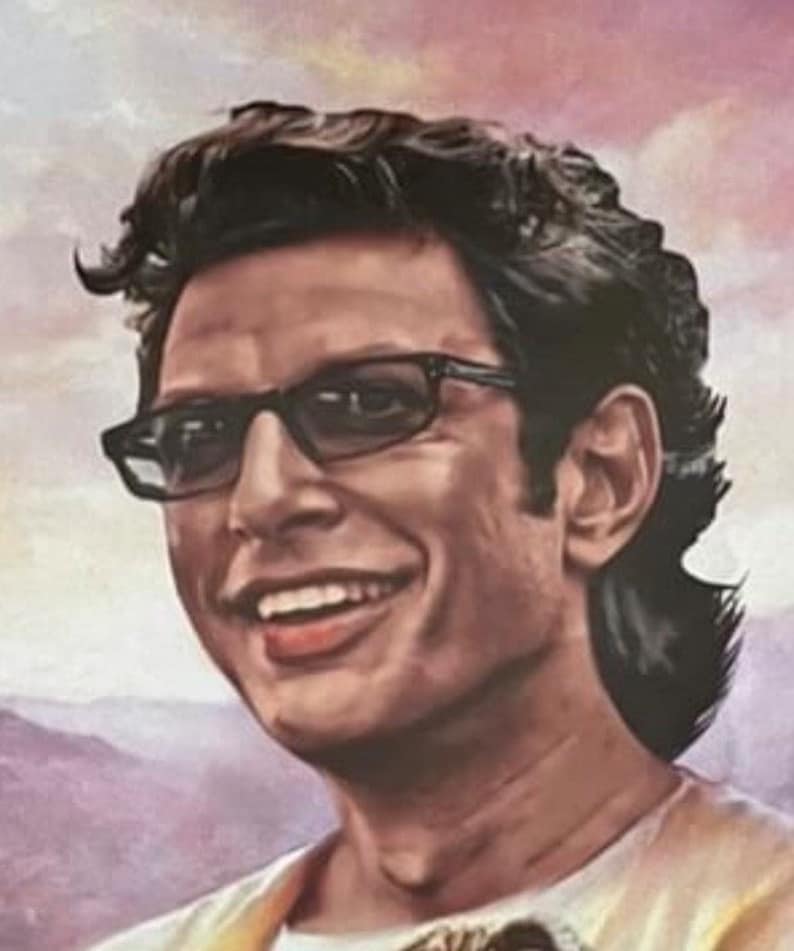 May include: A portrait of a smiling person wearing black-framed glasses. The person has dark hair and is wearing a light-colored shirt. The background features a soft, blurred landscape with shades of purple and pink.