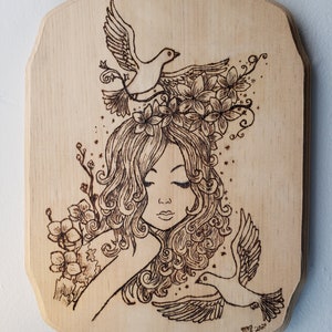 Wood burned curly haired girl and nature