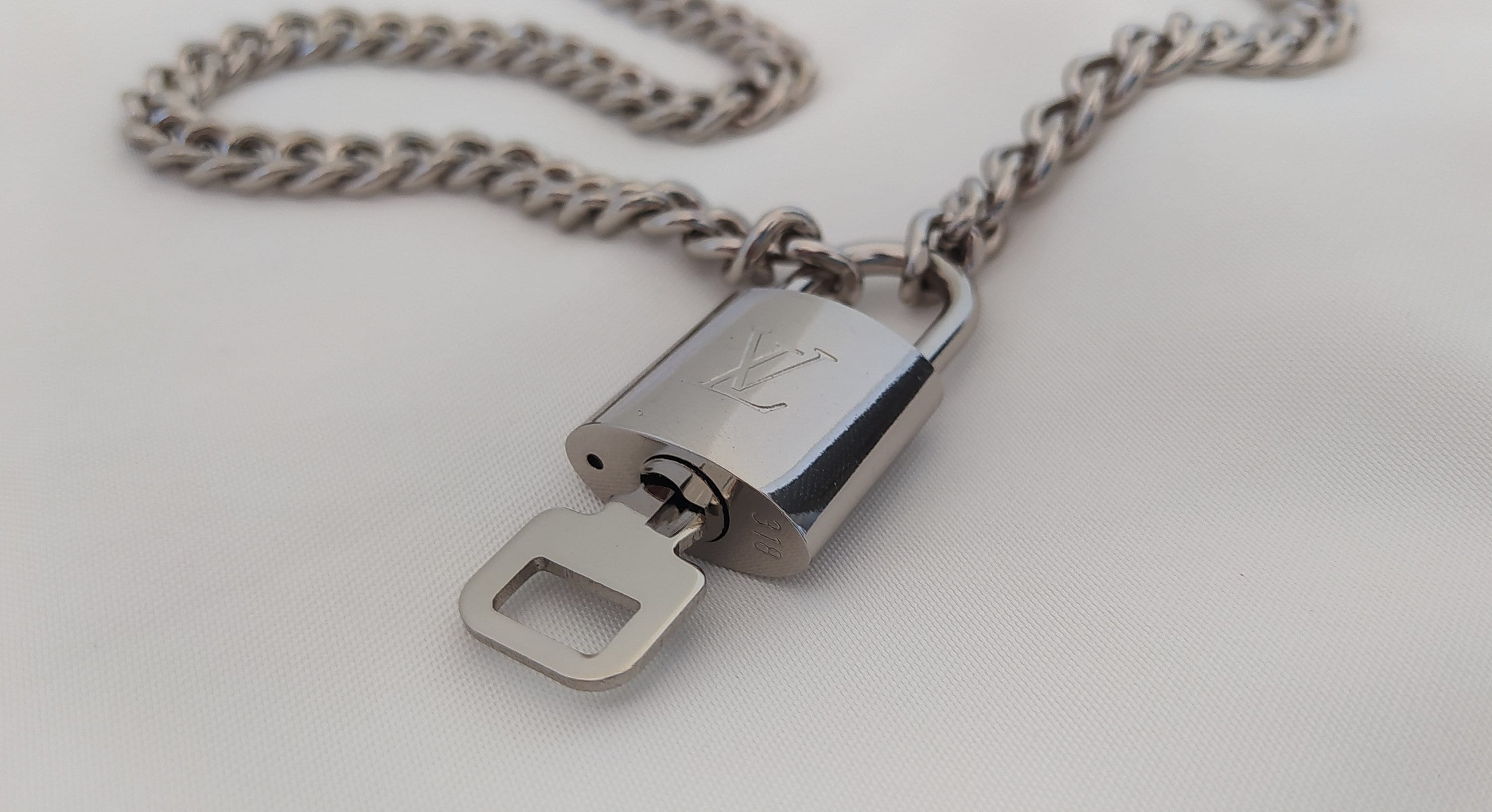 Louis Vuitton Lock & Key Necklace – Lady Luxe Collection