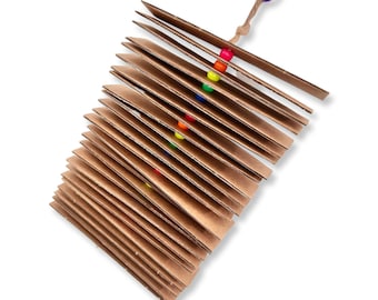 Cardboard Chew Tower- cardboard, pony beads