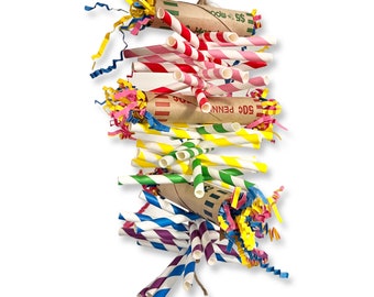 May include: A colorful bird toy made of paper straws, cardboard tubes, and colorful paper streamers. The toy is hanging from a string and is designed for small birds to play with.