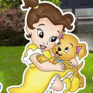 May include: A cartoon-style yard sign featuring a young character with brown hair in a ponytail wearing a yellow dress, sitting on the grass while hugging a small, light brown puppy with a blue collar. The illustration has a white border outline.