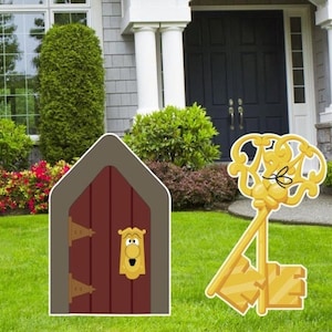 May include: A golden key with a whimsical face and a red door with a golden knocker. The key and door are yard decorations.