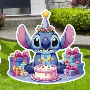 May include: A blue and pink cartoon character with large ears, wearing a party hat, sitting on a pink cake with candles and surrounded by presents.