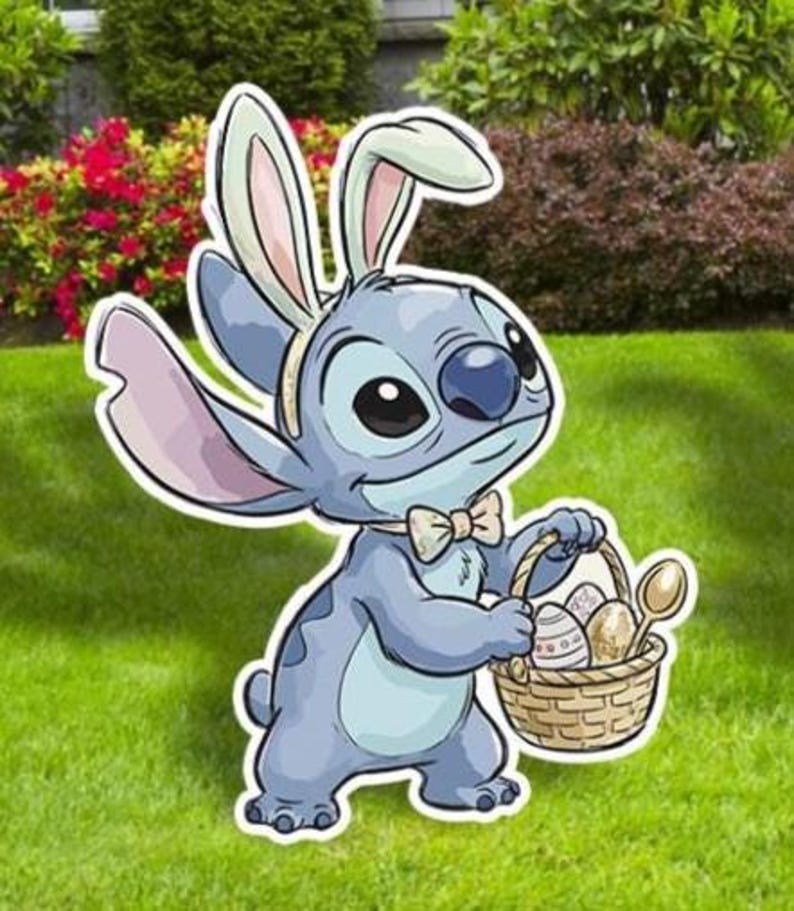May include: A blue cartoon character with bunny ears and a bow tie, holding a basket of Easter eggs and a spoon. The character is standing on green grass, with bushes and trees in the background.