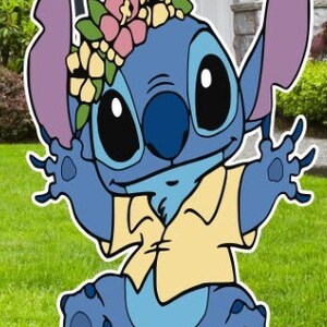 May include: A blue cartoon character with large eyes and a flower crown. The character is wearing a yellow shirt and has a friendly expression.