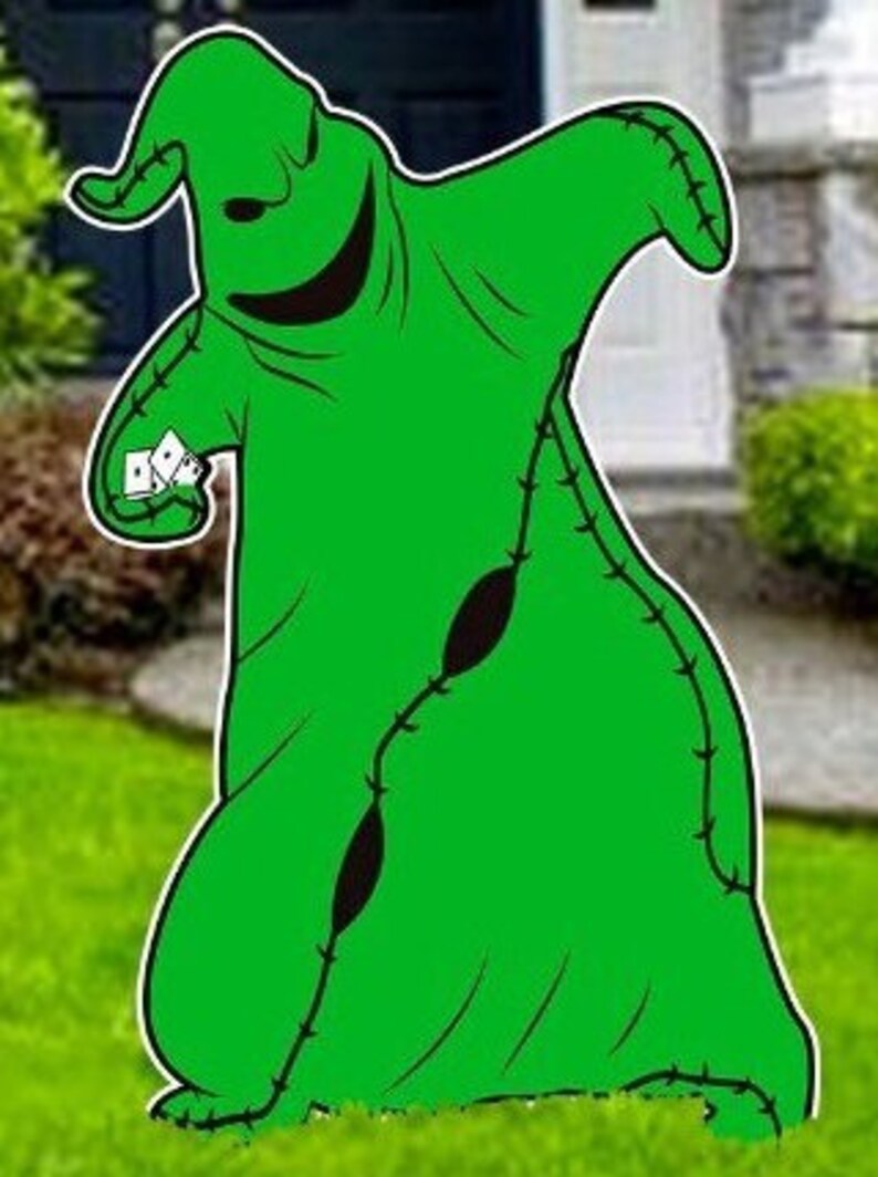 K&ouml;nnte beinhalten: Eine gr&uuml;ne, gen&auml;hte Comicfigur mit einem breiten L&auml;cheln und einem schwarzen Augenklappen. Die Figur h&auml;lt einen Stapel wei&szlig;er Karten in ihrer rechten Hand. Die Figur steht auf einem gr&uuml;nen Rasen.