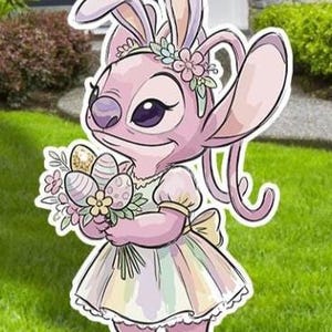 May include: A pink cartoon character with bunny ears, wearing a dress and holding a bouquet of Easter eggs. The character has large eyes and is decorated with flowers. The image is a yard decoration.