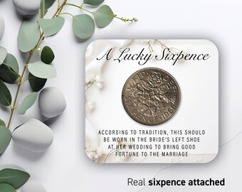 Regalo de la suerte de seis peniques de plata para la novia: Algo antiguo, algo azul. Dije para zapatos o ramo de novia en bolsa de organza azul. Moneda tradicional 47.