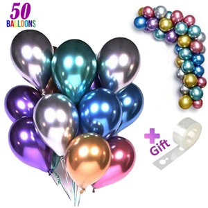 May include: A bunch of 50 iridescent chrome balloons in various colors, including purple, blue, green, silver, gold, and pink. The balloons are arranged in a cluster and are ready to be inflated. A roll of clear balloon tape is included as a gift.