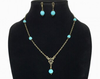 Conjunto de joyas de bronce turquesa Kingman: collar y pendientes colgantes