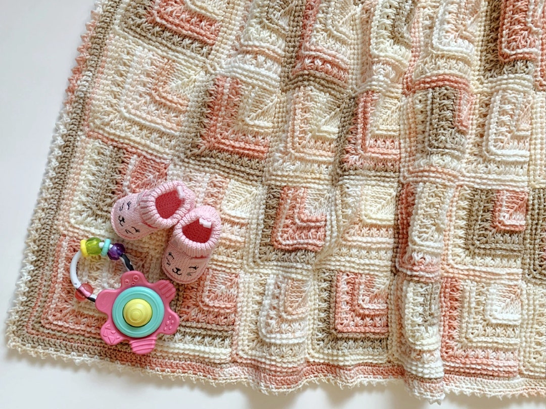 Patrón fácil de manta de bebé tejida a crochet tunecino con