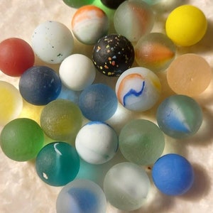 25 Nova Scotia Seaglass marbles, these in this particular group are not exact seaglass marbles you will receive bit all unique and colorful