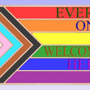 May include: A wooden sign with a rainbow flag design and the text "EVERY ONE IS WELCOME HERE" in different colors. A red heart is in the bottom right corner.