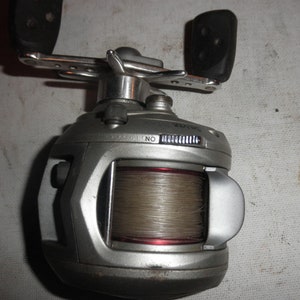 VINTAGE ABU GARCIA AMBASSADEUR 6000 REEL SWEDEN Red