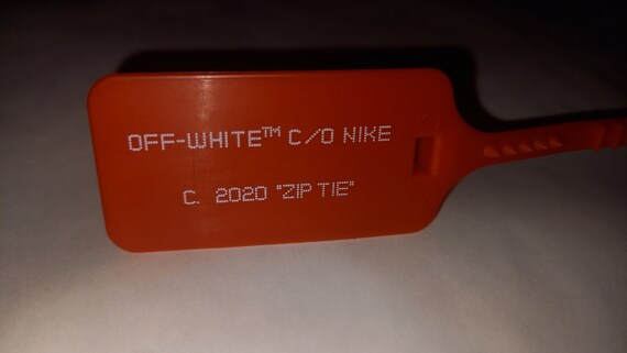 trainers with red tag