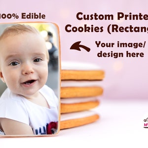 May include: A rectangular cookie with an edible image of a baby boy printed on it. The cookie is 100% edible and can be customized with your own image or design. The text "Custom Printed Cookies (Rectangle)" and "Your image/design here" is printed on the image.