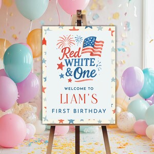 Puede incluir: Un letrero de bienvenida para una fiesta de primer cumplea&ntilde;os, con el texto "Red, White & One" y una ilustraci&oacute;n de la bandera estadounidense. El letrero est&aacute; sobre un caballete, rodeado de globos y confeti.