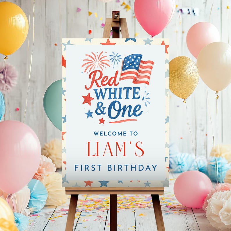 Puede incluir: Un caballete de madera que muestra un letrero con el texto "Red, White & One" y "Welcome to Liam's First Birthday". El letrero presenta una bandera estadounidense y gr&aacute;ficos de estrellas. Globos rosas, amarillos y dorados y confeti decoran la escena.