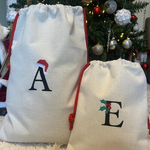 Personalised Linen large Christmas Sack, Embroidered Initial, Santa Hat or Holly Design. Two sizes