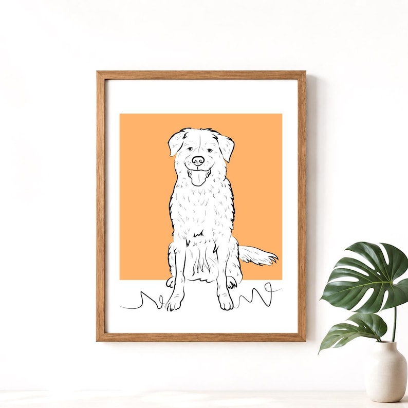 May include: A framed art print featuring a black and white line drawing of a dog sitting with its tongue out. The dog is set against an orange background. The artwork is in a wooden frame and is displayed on a white surface.