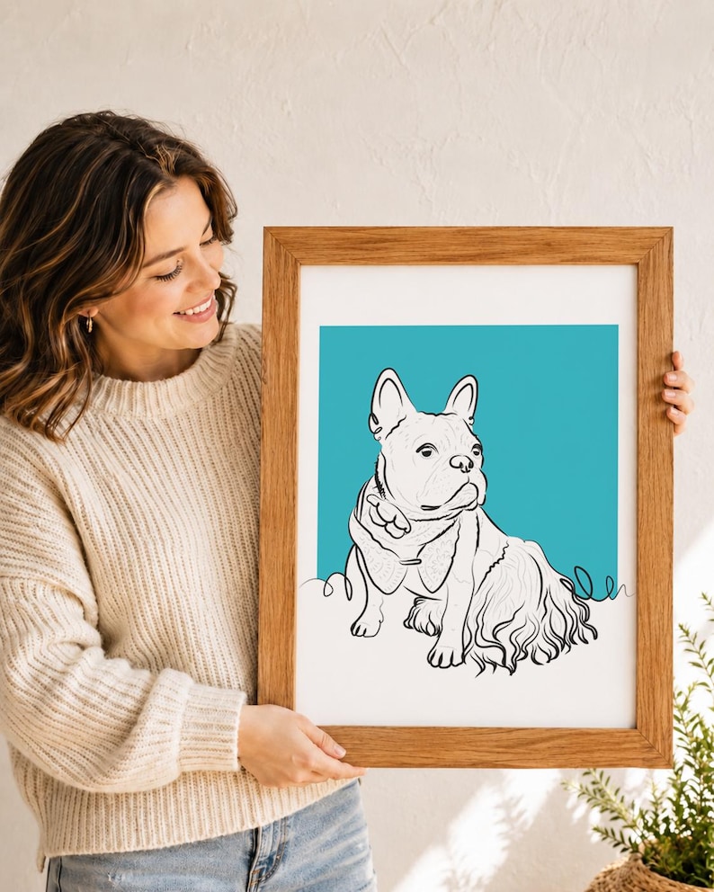 Puede incluir: Una l&aacute;mina enmarcada con un dibujo de l&iacute;neas negras de un bulldog franc&eacute;s sobre un fondo turquesa s&oacute;lido. El perro est&aacute; representado con un estilo de l&iacute;nea continua, lleva una pajarita y est&aacute; dentro de un marco rectangular de madera clara.