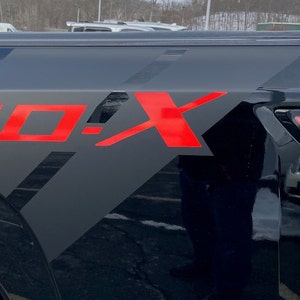 Graphics for 2022-25 Nissan Frontier Pro-X Rear Quarter Fender Flare Version Short Box Stripes Decals Designs