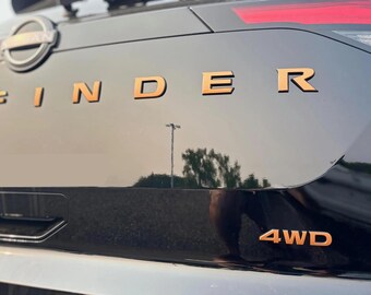 Gloss Black Overlay Emblem For 2022-2024 Nissan Pathfinder Platinum AWD – Front