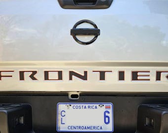 Latin America and Caribbean Two Color Tailgate Decal compatible with the 2022-2026 Nissan Frontier