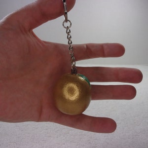 Hand painted gold orange keychain squishy