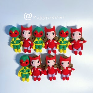 May include: A set of nine crocheted figures, including Wanda Maximoff and Vision from the Marvel Cinematic Universe. The figures are dressed in their signature red and green costumes. The figures are all standing on a white surface. @Puggycrochet