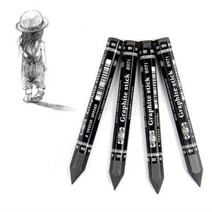 May include: Four black graphite pencils with the text "Graphite stick 8971" and "KOH-I-NOOR HARDTMUTH" printed on the side. The pencils are sharpened and ready to use.