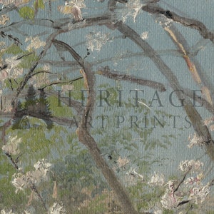 Close up view of a fine art print depicting a tree with pink and white blossoms in the spring time.