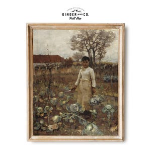 May include: Framed vintage art print of a child in a field of cabbages. The child is wearing a white outfit and holding a small tool. The background features a red-roofed building and trees. The print is from Ginger and Co. Print Shop.