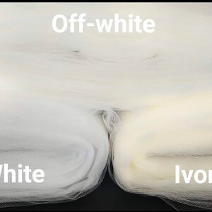 May include: Three swatches of tulle fabric in different shades of white: white, off-white, and ivory.