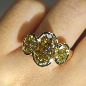 Oval Champagne Moissanite Three Stone Ring – 10k Yellow Gold