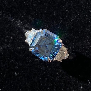 Asscher Cut Blue Color Three Stone Basket VVS Moissanite Ring