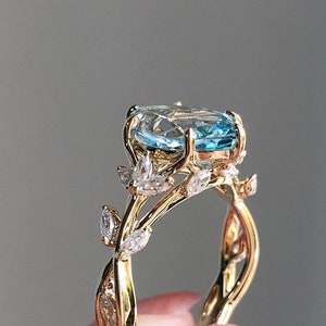 Marquise Cut Floral Infinity Shank VVS Lab Grown Aquamarine Ring