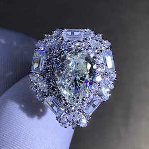 4 Carat Pear Cut Moissanite Ring Double Halo VVS G-H Near Colorless