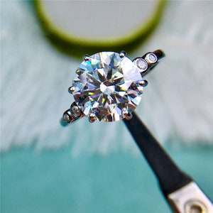 4 Carat Round Cut Moissanite Ring 6 Prong 5 Stone Scalloped Shank VVS D Colorless