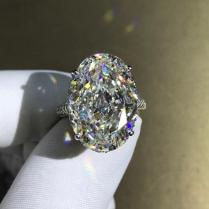 30 Carat Oval Cut G-H Colorless Subtle Halo Bead-set Cathedral Moissanite Ring