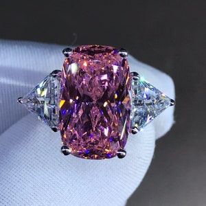 6 Carat Pink Elongated Cushion Cut Three Stone Reverse Tapered Moissanite Ring