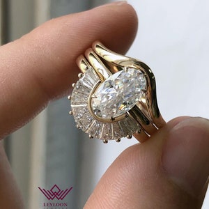 Oval Cut Three-Piece Bridal D Color Moissanite Set
