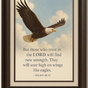 May include: Framed artwork featuring a soaring eagle against a cloudy sky. The eagle has brown feathers, a white head, and a yellow beak. The artwork includes the text "But those who trust in the LORD will find new strength..." from Isaiah 40:31.
