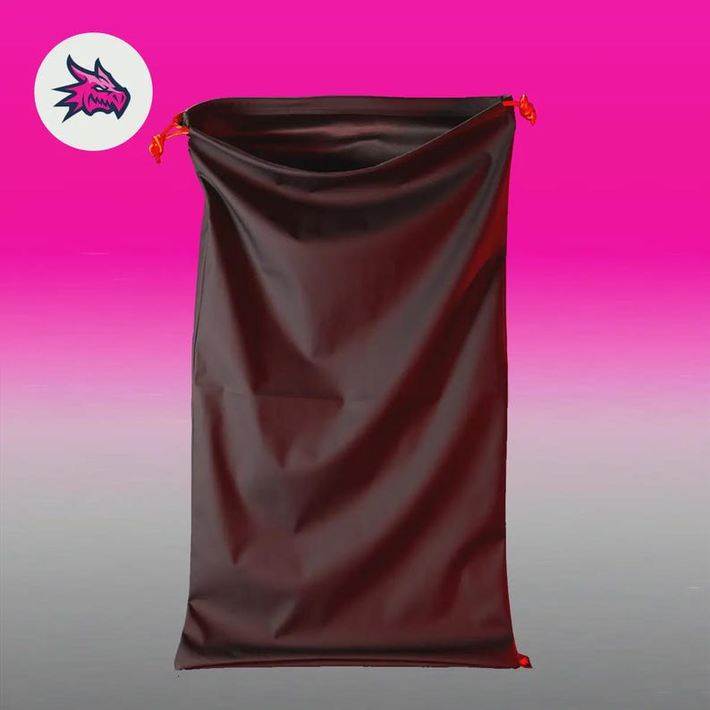May include: A dark brown drawstring bag with orange drawstrings. The bag is rectangular and appears to be made of a smooth, possibly synthetic material. A white circle with a purple dragon logo is in the upper left corner.